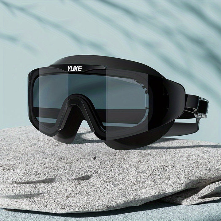 Adult triathlon swimming goggles; anti-fog, waterproof, & HD clear vision for competitive open water swims.