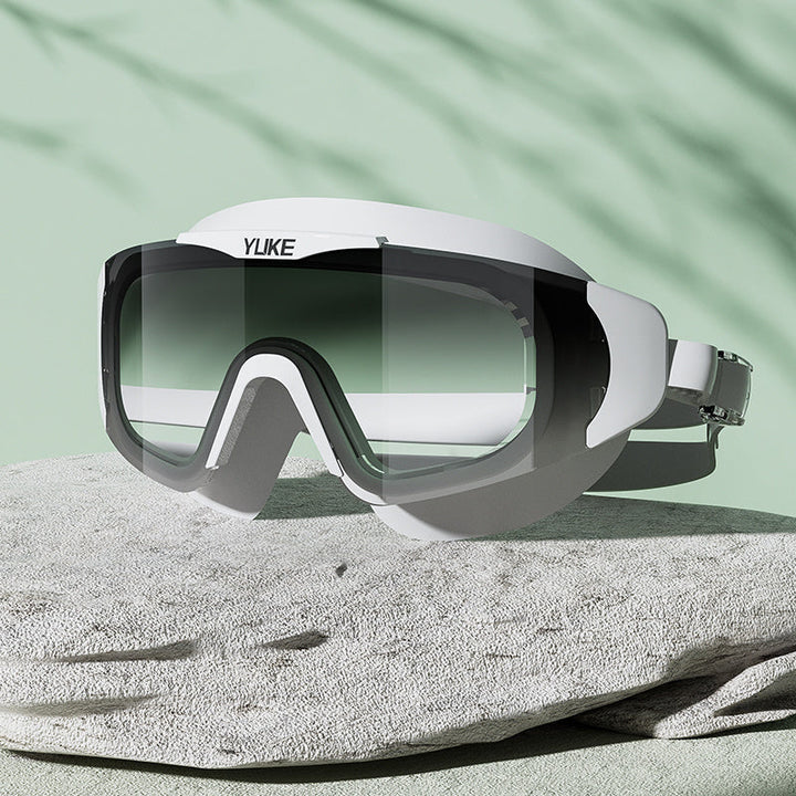 Pool swimming goggles for adults: anti-fog, waterproof, & HD clear vision for training & recreational use.