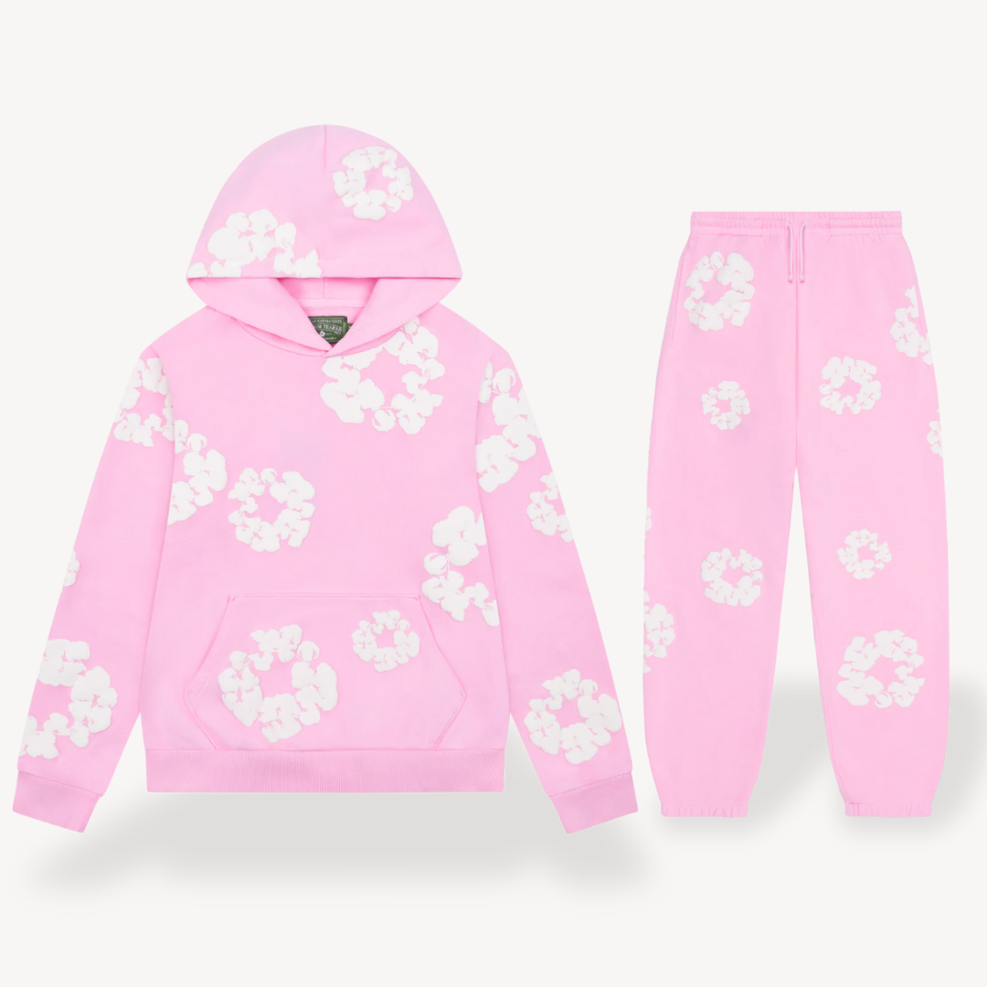 Unisex hoodie with bold white floral graphics on black cotton, combines style and comfort for a standout look.