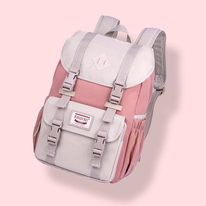 Water-resistant 20-35L daypack, ideal for hiking, school, or work. Features multiple compartments.