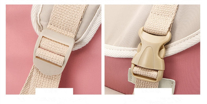 Front view of organized multi-compartment travel backpack (20-35L), showing various pockets & zippers.