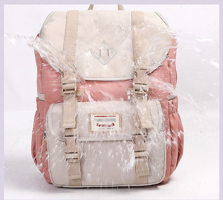 Side view of the water-resistant multi-compartment travel backpack (20-35L), highlighting its durable design.