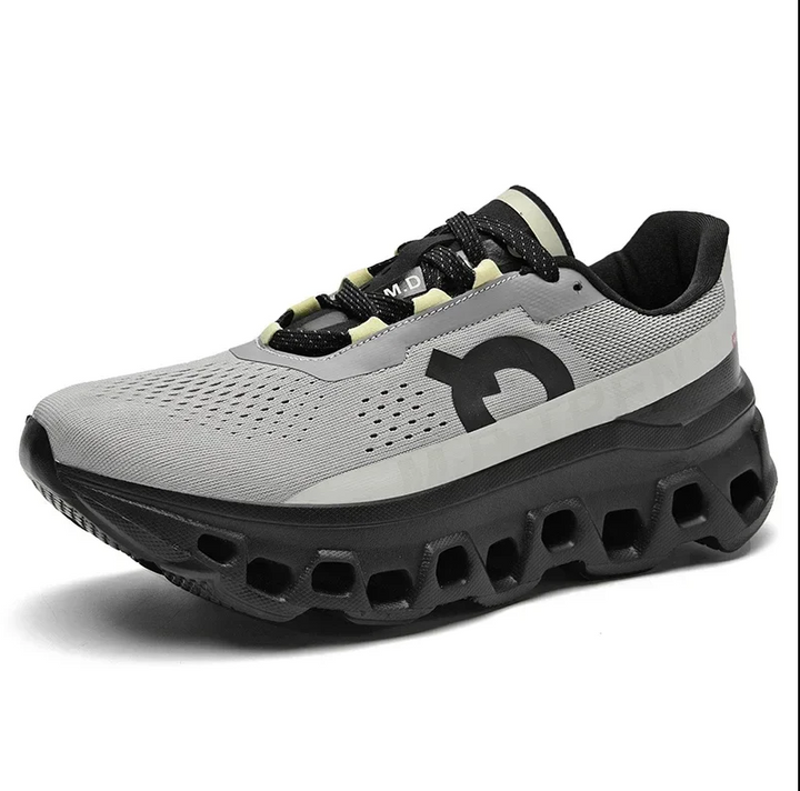 Close-up of lightweight fabric on unisex athletic shoes, ensuring comfort for long walks & runs.