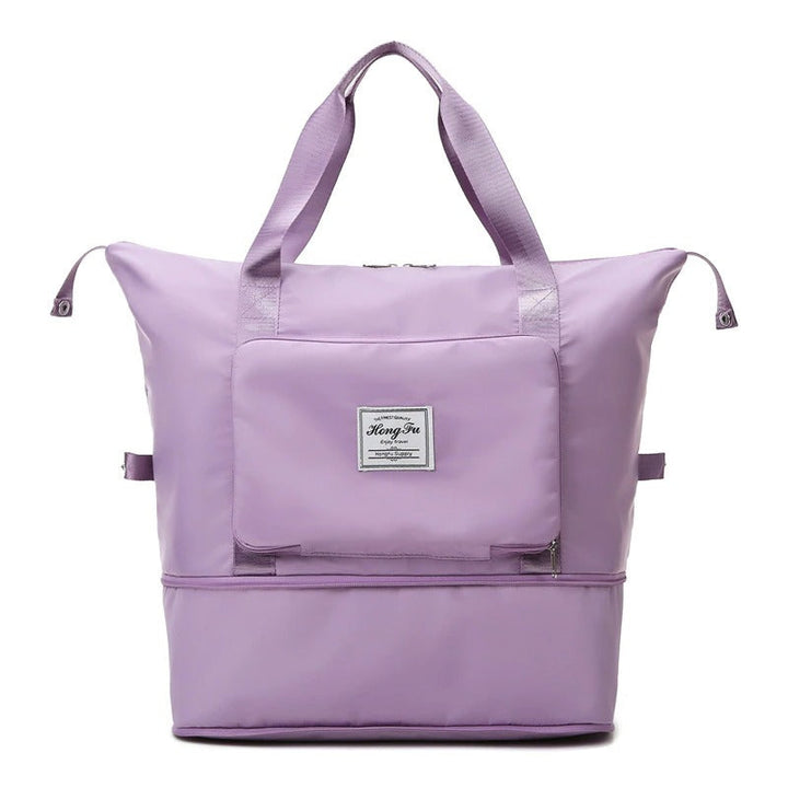 Woman carrying a lightweight unisex waterproof weekender bag, ready for a trip. Durable and stylish luggage.