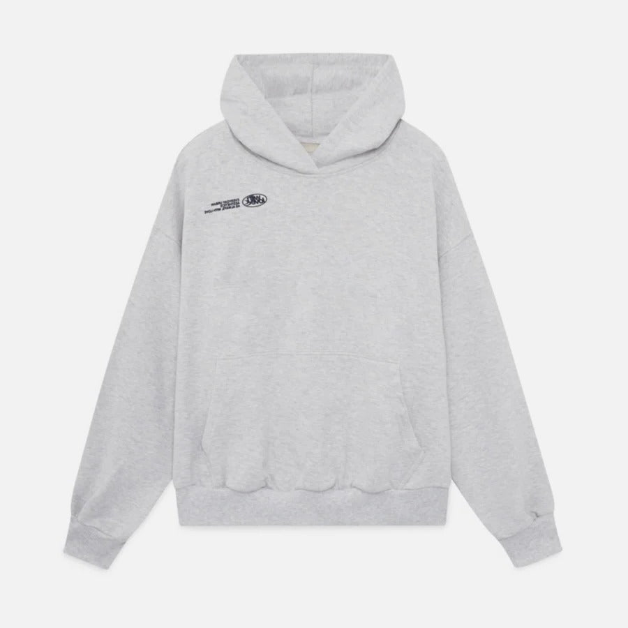 Trendy unisex oversized hoodie showcasing a cool slogan print, perfect for a relaxed, modern urban style.