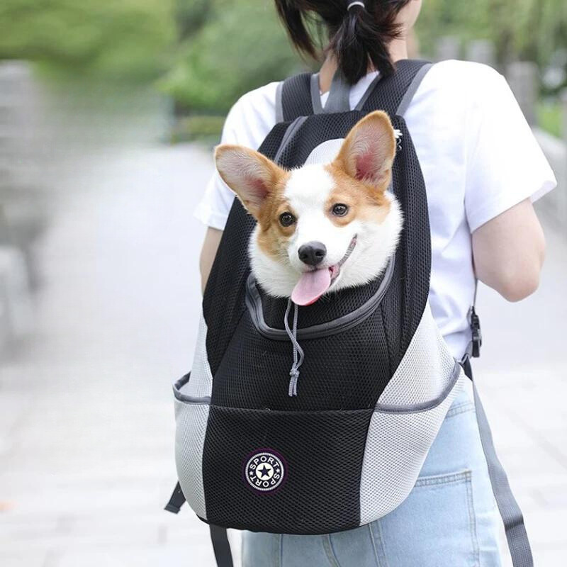 Unisex pet dog carrier backpack for travel, featuring breathable mesh & adjustable straps for comfort & safety.