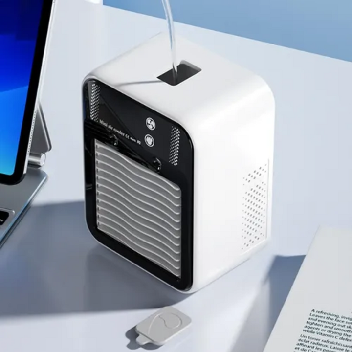 Efficient portable air cooler fan with digital display. 3-speed rechargeable fan, delivers cool breeze for personal use.