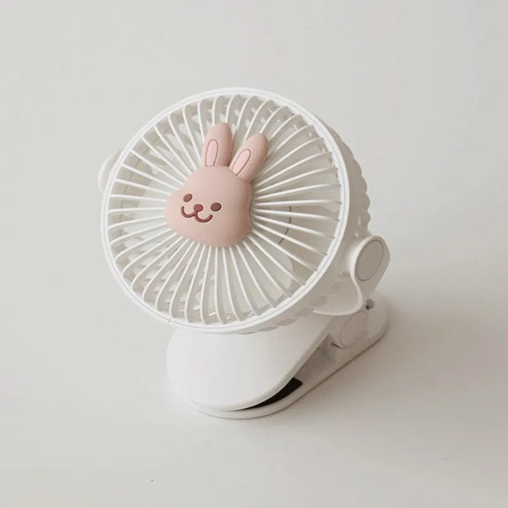 Versatile clip-on portable fan for strollers, desks, or personal cooling during travel. Rechargeable.