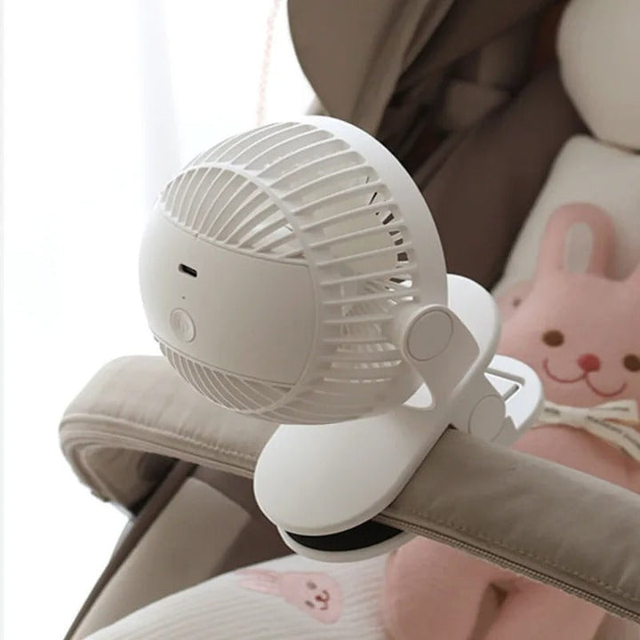 Unisex portable fan with strong clip and rechargeable battery for personal cooling, a true outdoor essential.