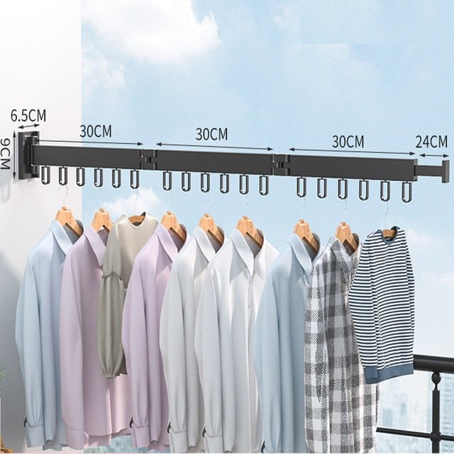 Retractable clothes drying rack mounted on a balcony wall, perfect for air-drying clothes. Space-saving.