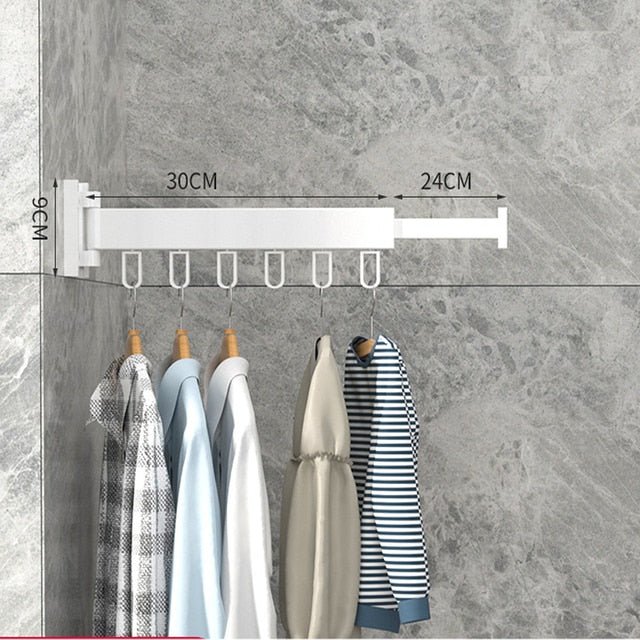 Close-up of the sturdy retractable mechanism of a wall-mounted stainless steel clothes drying rack.
