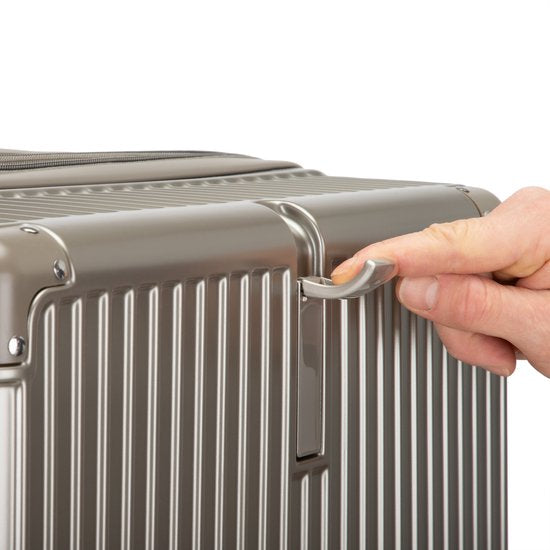 Versatile hard shell luggage, suitable for carry-on or checked, with USB charging & built-in cup holder.