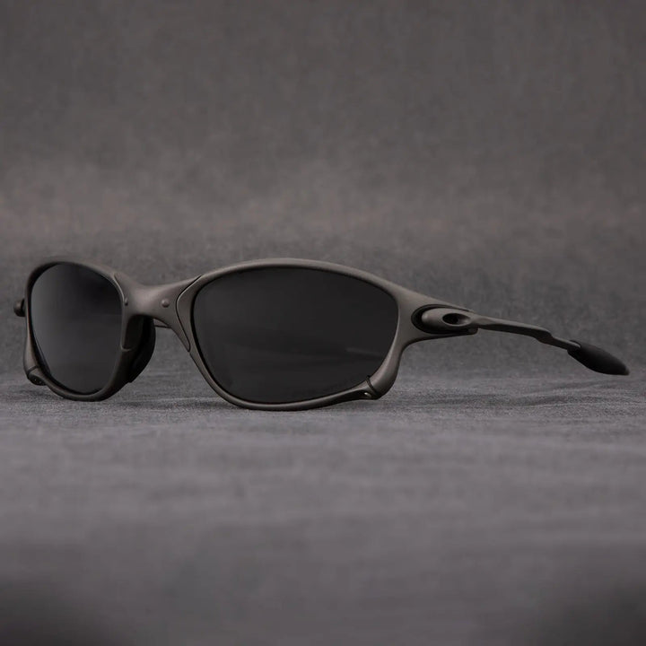 Modern unisex polarized sunglasses: lightweight metallic frame & striking red lenses. Great for beach, sport, & glare reduction.