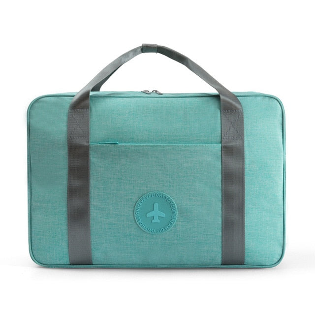 Handy luggage accessory: a unisex universal carry-on bag for light, organized travel.