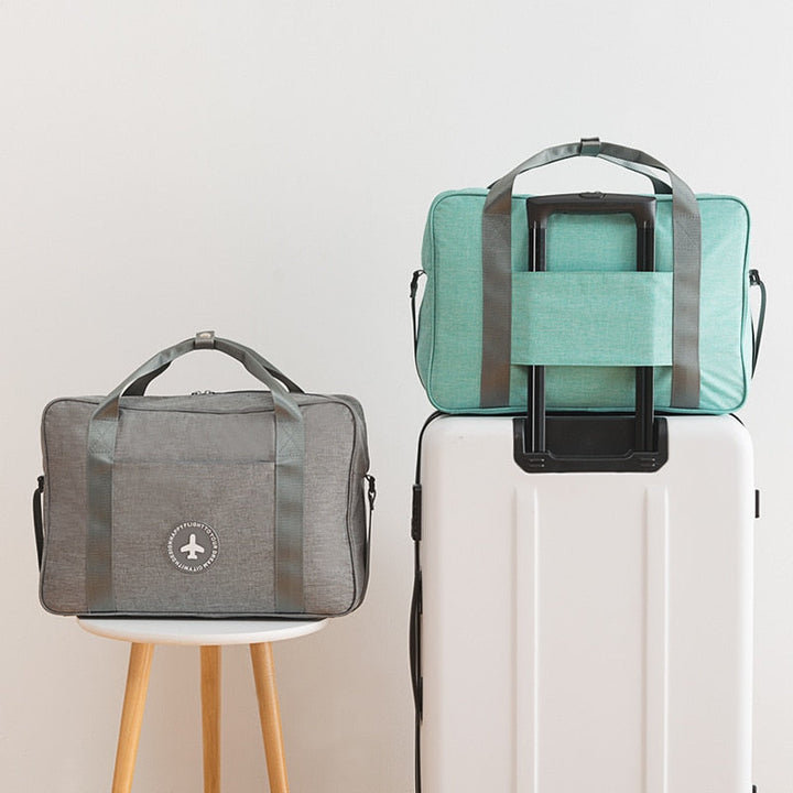 Attachable universal carry-on travel bag, an essential luggage accessory for airport travel.
