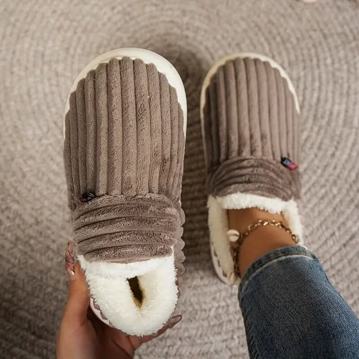 Unisex warm indoor slippers, non-slip & machine washable for easy care.