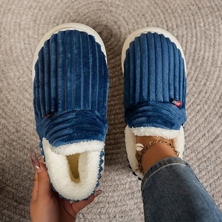 Ultra-soft thermal slippers, unisex design for ultimate indoor comfort & warmth.