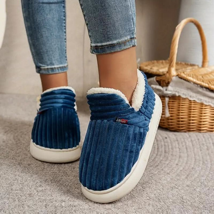 Soft thermal house shoes, machine washable for easy care; ultimate indoor warmth.