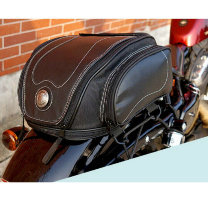 Expandable motorcycle tail bag offers ample storage for travel. Universal fit bike luggage & biker gear.