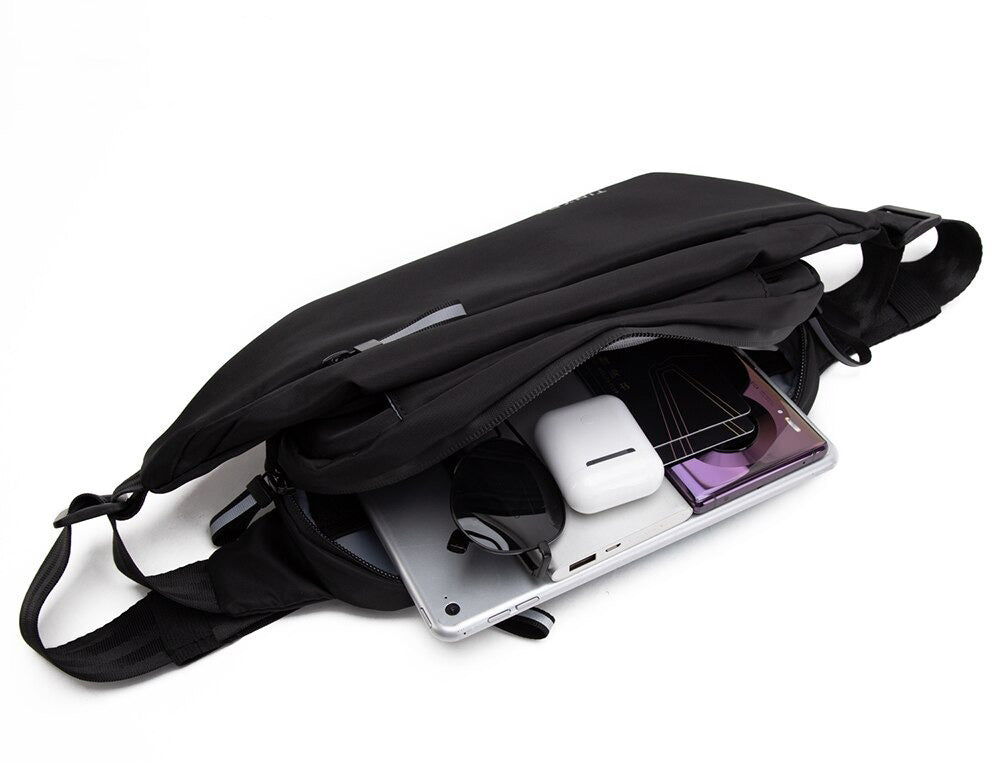 Unisex water-resistant multi-pocket fanny pack for hands-free travel & sports.