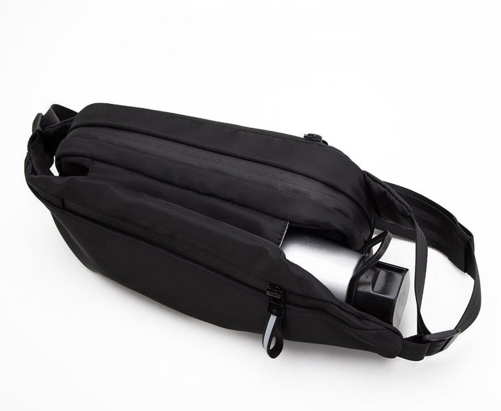 Unisex multi-pocket fanny pack, water-resistant, great for active travel.