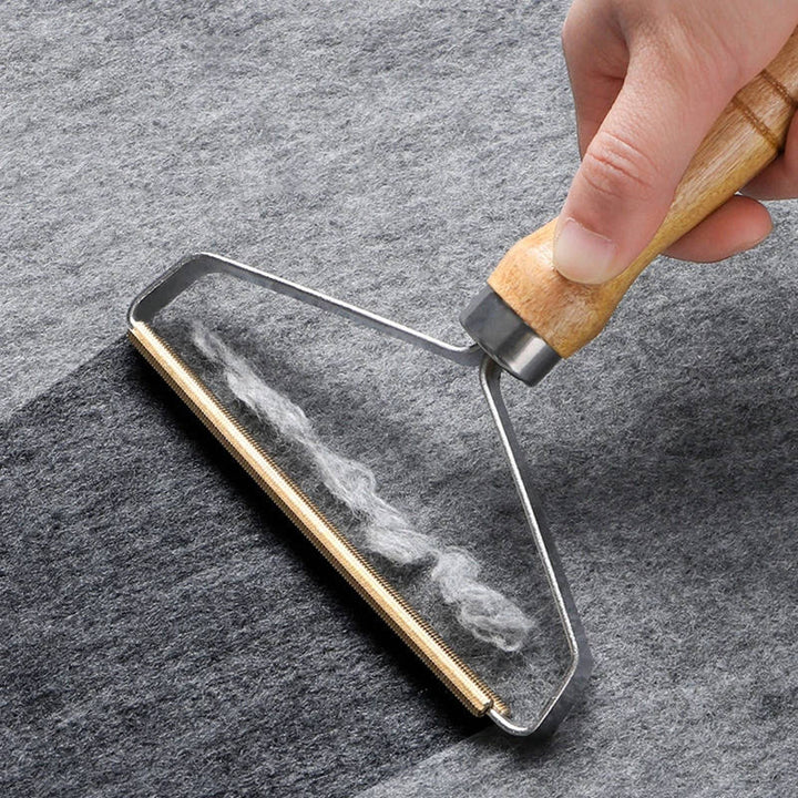 Efficient universal pet hair remover for upholstery, carpets, and clothing. Reusable lint & fur cleaner tool.