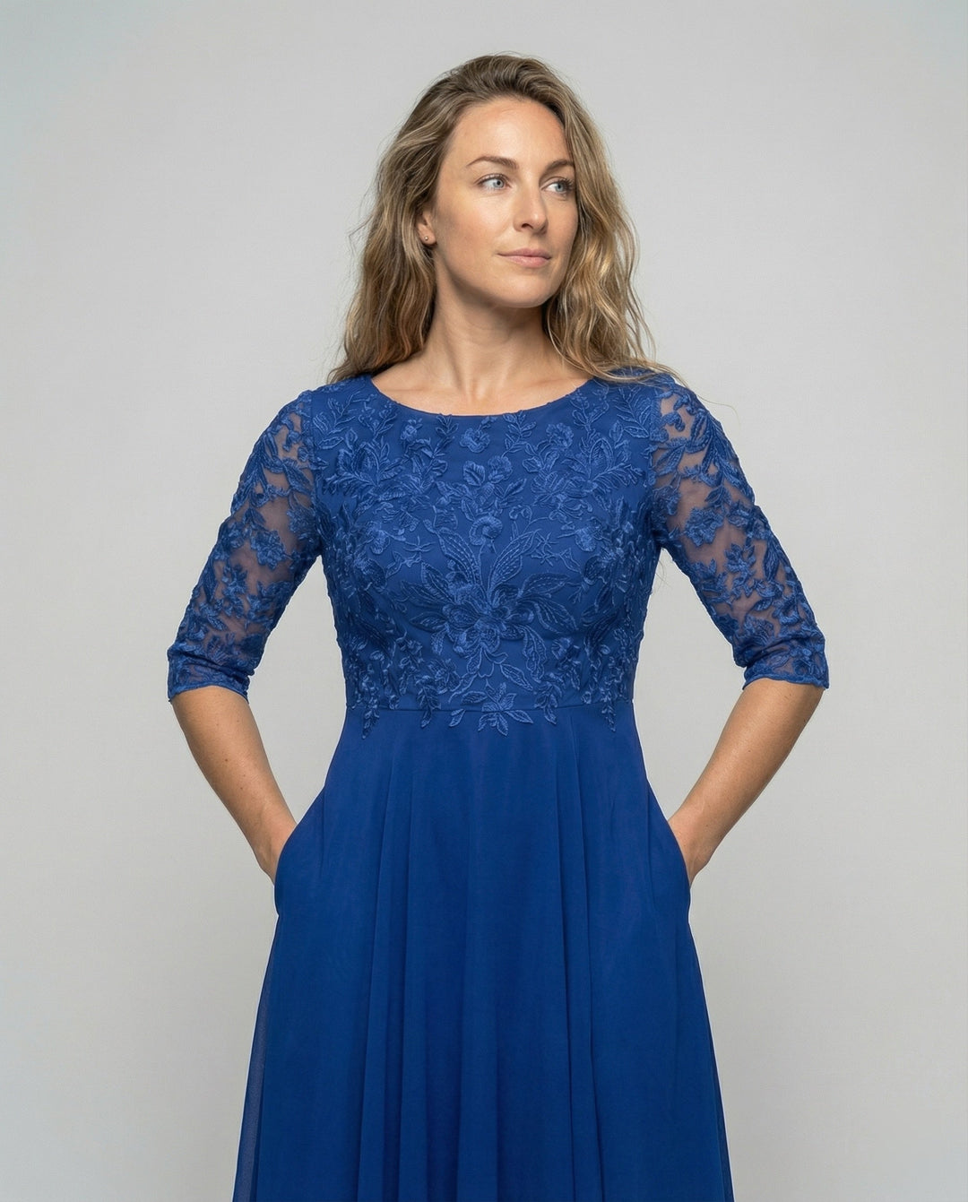 Women's elegant formal midi dress. Beautiful design, ideal for wedding guests and special occasions.