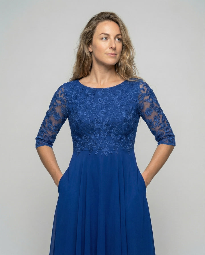 Women's elegant formal midi dress. Beautiful design, ideal for wedding guests and special occasions.