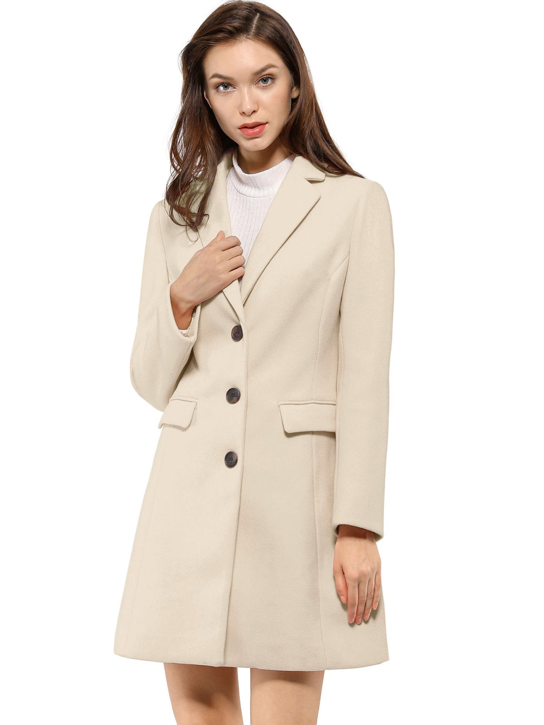 Long-sleeve women's tailored winter coat. Classic collared, elegant for business casual style.