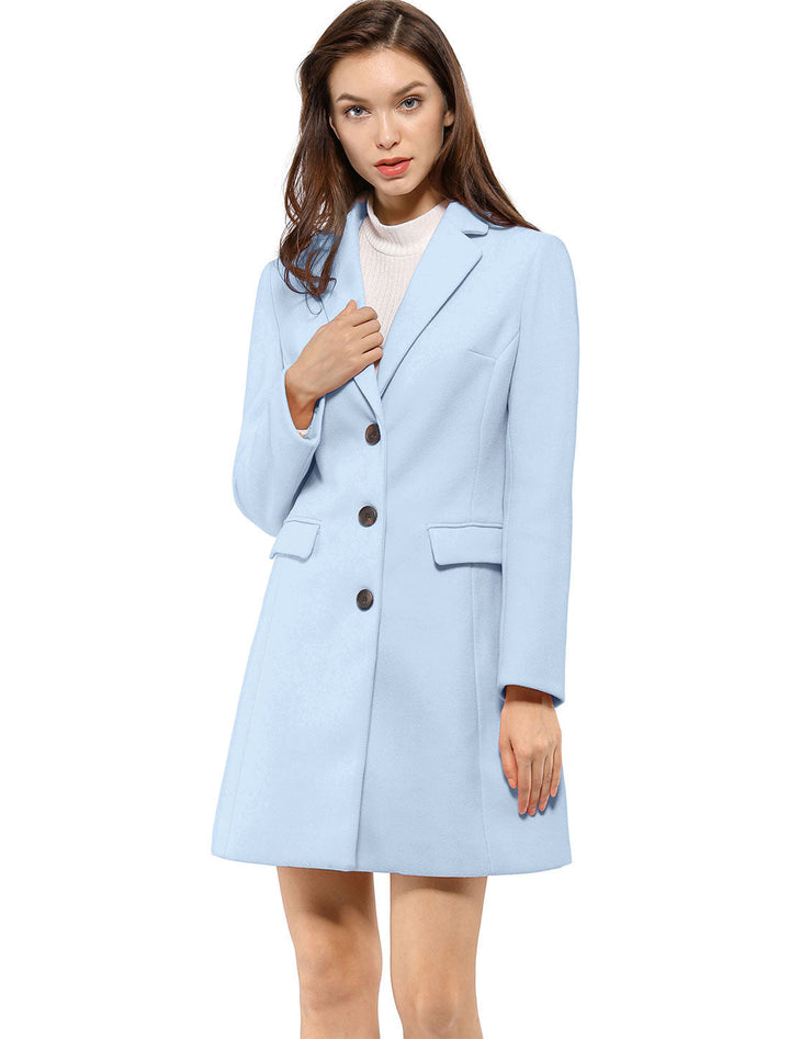 Ladies' classic tailored winter coat. Elegant collared outerwear for sophisticated cold weather style.
