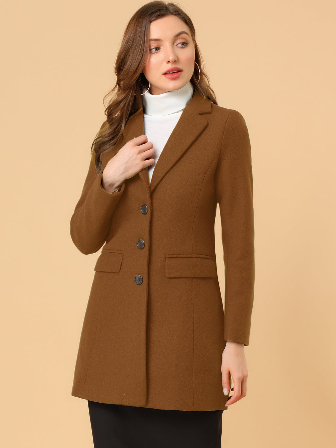 Women's tailored winter coat, classic collared & elegant. Ideal for cold weather style.