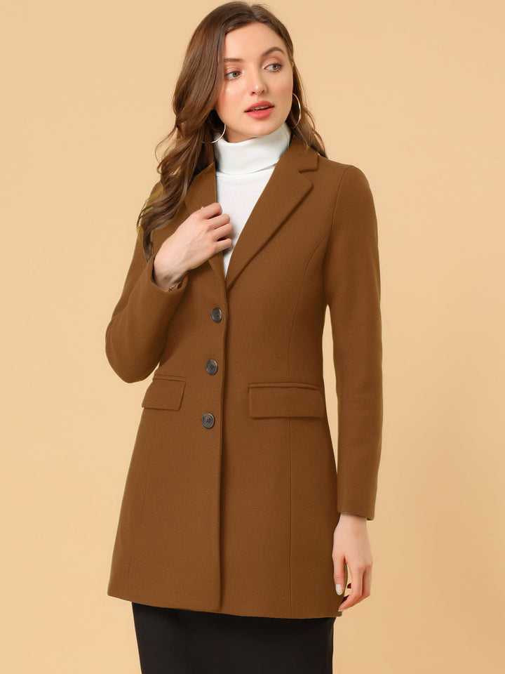 Women's tailored winter coat, classic collared & elegant. Ideal for cold weather style.