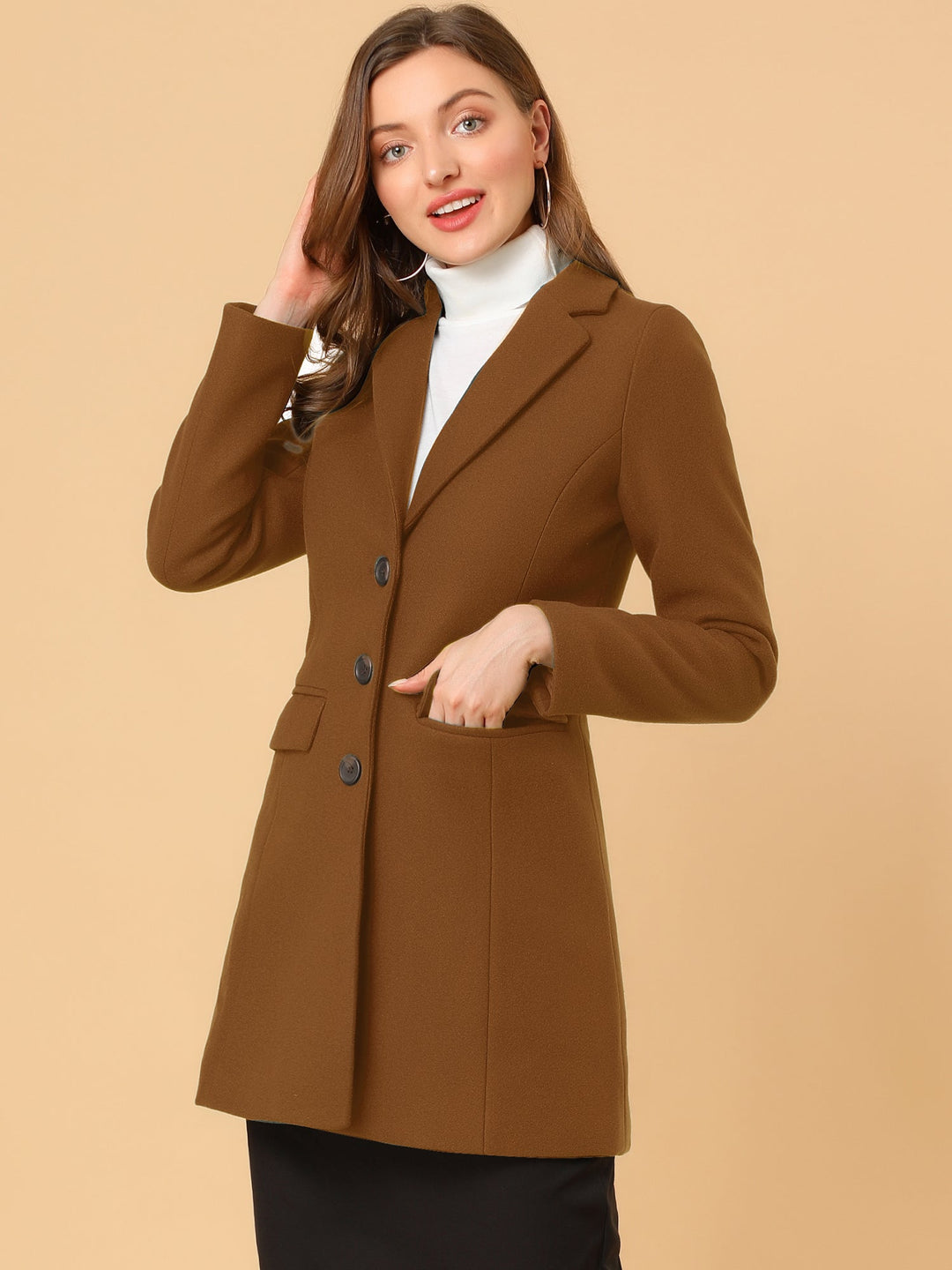 Classic women's long-sleeve winter coat. Elegant tailored fit, collared for business casual.
