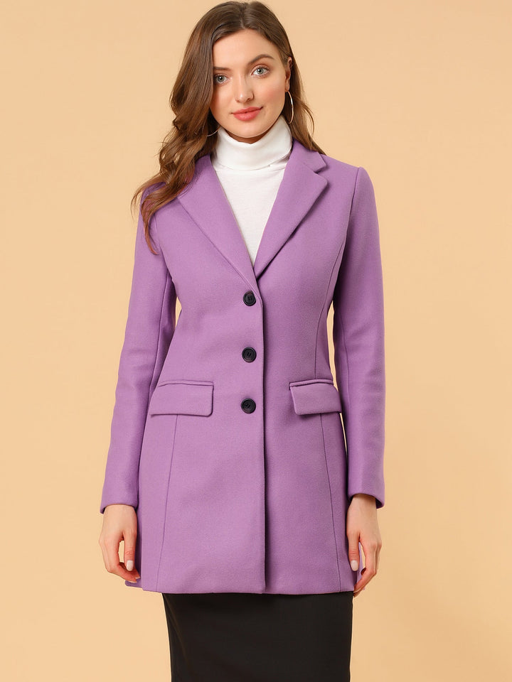 Elegant classic women's winter coat. Tailored fit, collared for sophisticated seasonal fashion.
