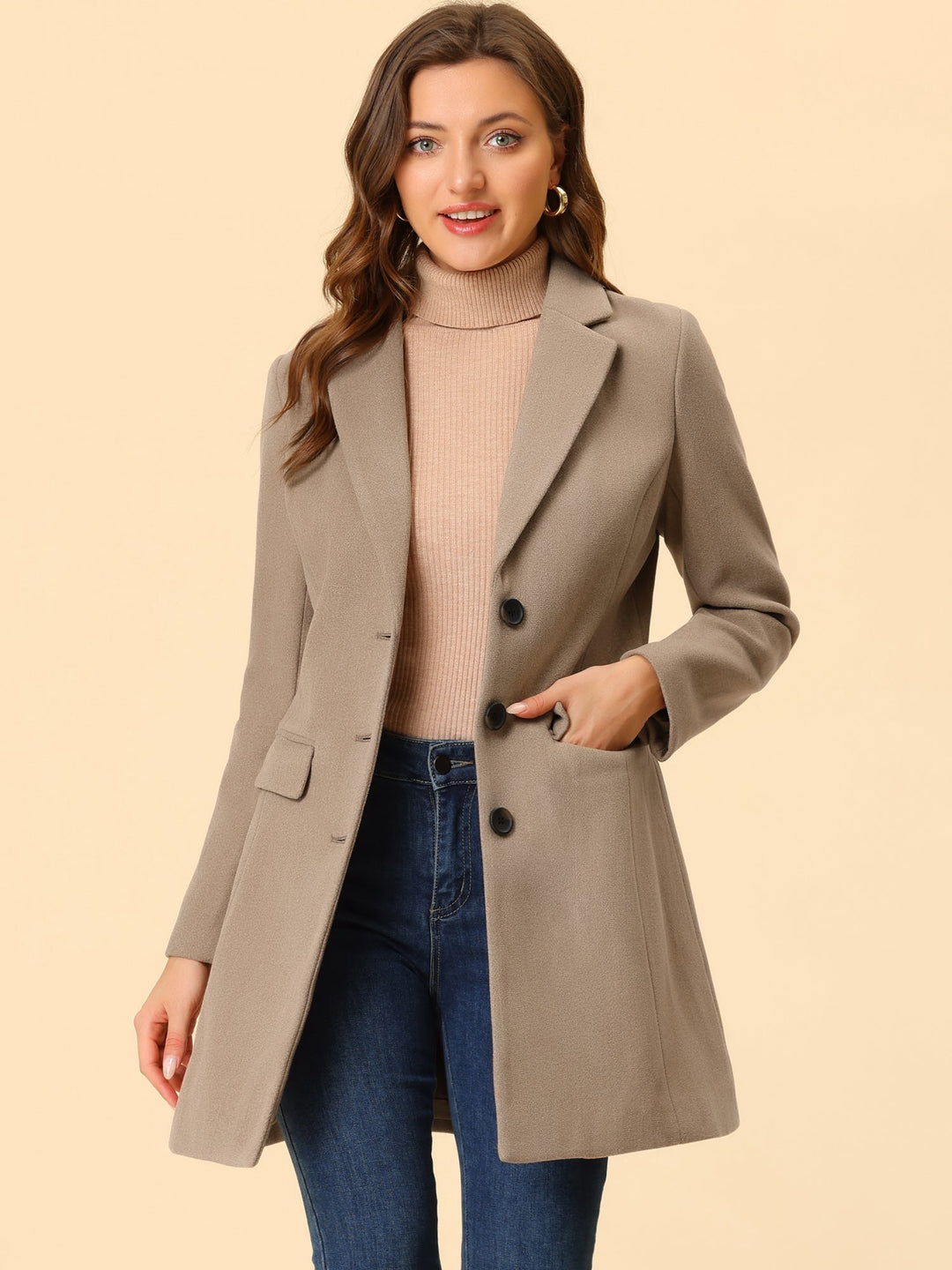 Tailored women's long-sleeve winter coat. Classic collared, elegant for cold weather business casual.