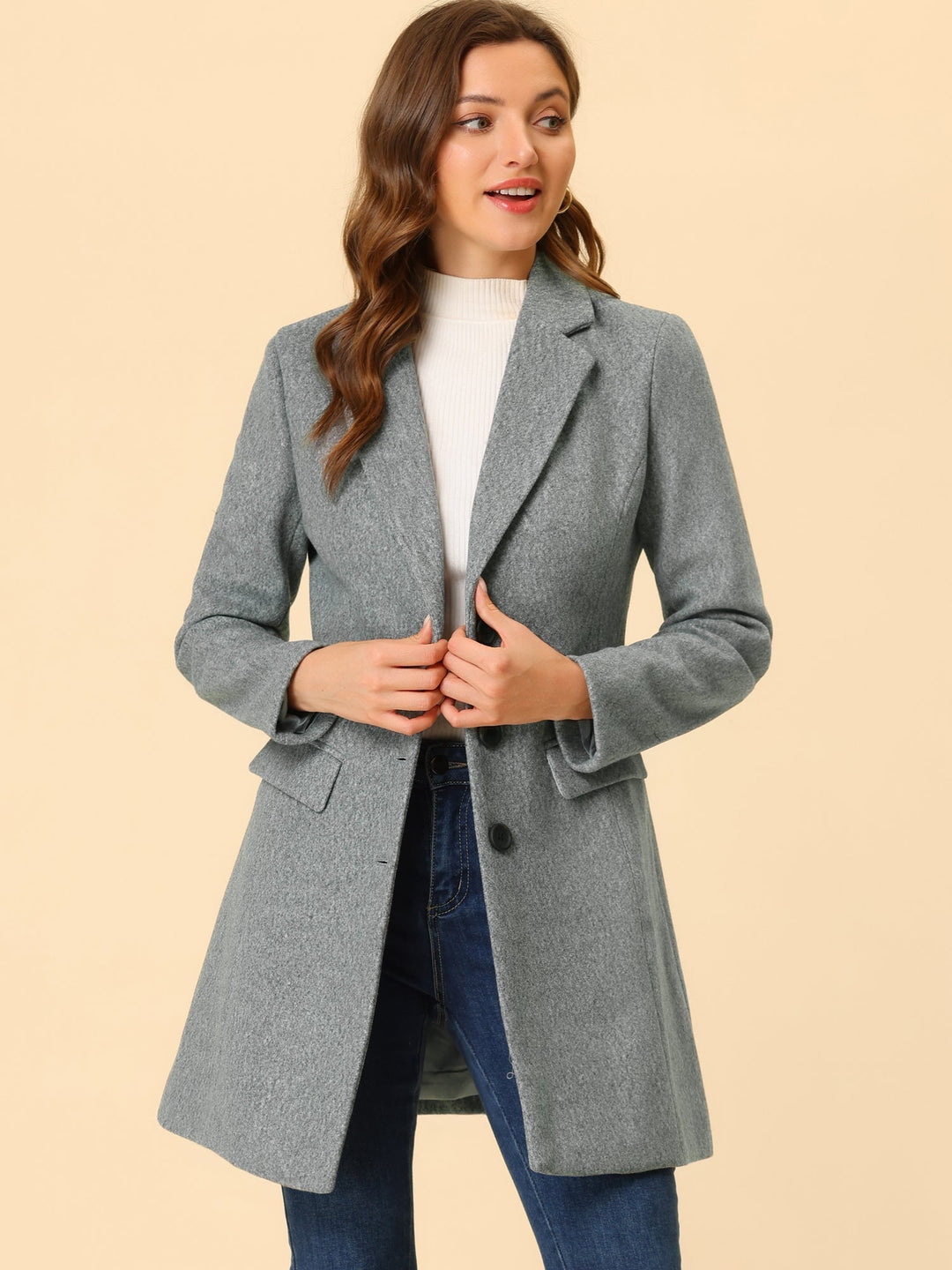 Sophisticated women's classic winter coat. Elegant tailored fit, collared for versatile outerwear.