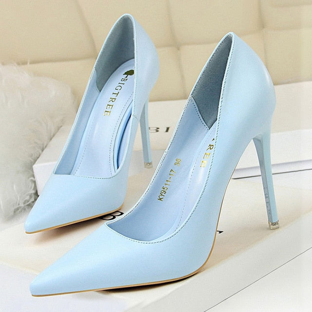 Side view of women's elegant pointed-toe high heel pumps, showcasing formal and party fashion footwear.