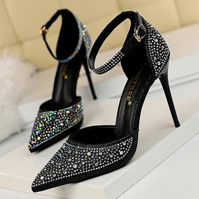 Elegant rhinestone high heel sandals with an ankle strap, ideal formal footwear for wedding guests.