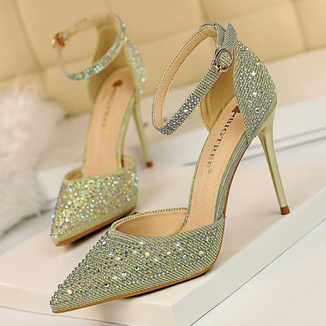 Women's stiletto sandals with rhinestones & an ankle strap, a glamorous high heel party shoe.