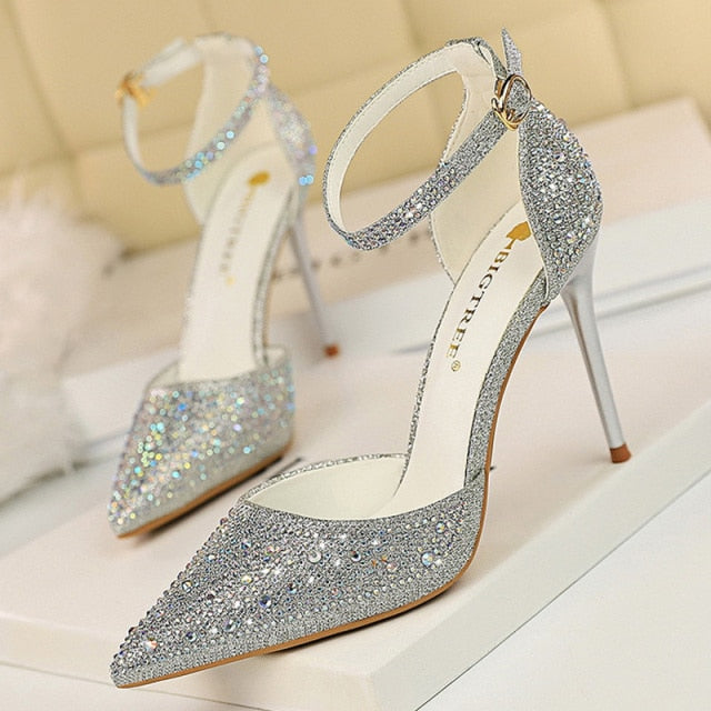 Secure ankle strap stiletto sandals for women, adorned with glamorous rhinestones, ideal party shoes.