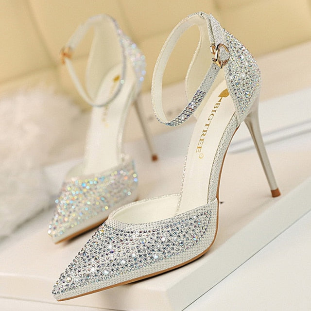 Stylish women's rhinestone stiletto sandals with a chic ankle strap, perfect elegant formal footwear.