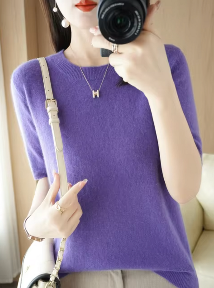 Women's elegant short-sleeved knit sweater. Slim-fit and versatile for modern everyday fashion.