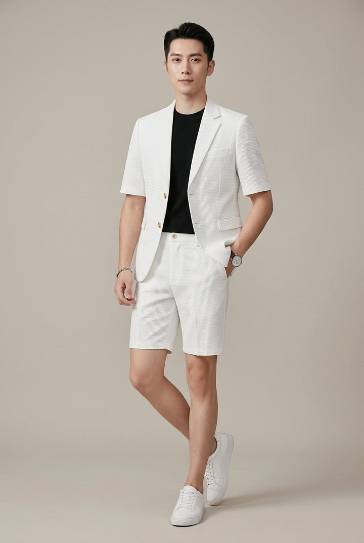 Coordinated men's two-piece outfit: a short sleeve blazer & shorts. Great for warm-weather casual or smart-casual looks.