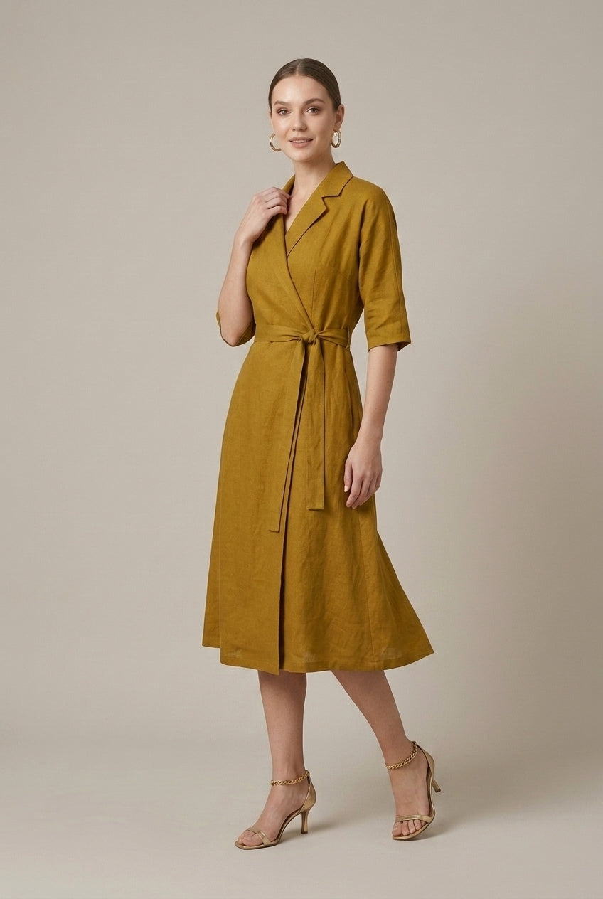 Stylish women's midi wrap dress with a comfortable relaxed fit and elegant belted design. All-season.