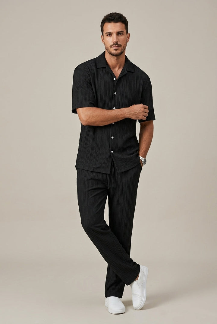 Relaxed fit men's casual two-piece set featuring a stylish textured short-sleeve shirt & comfortable drawstring trousers.