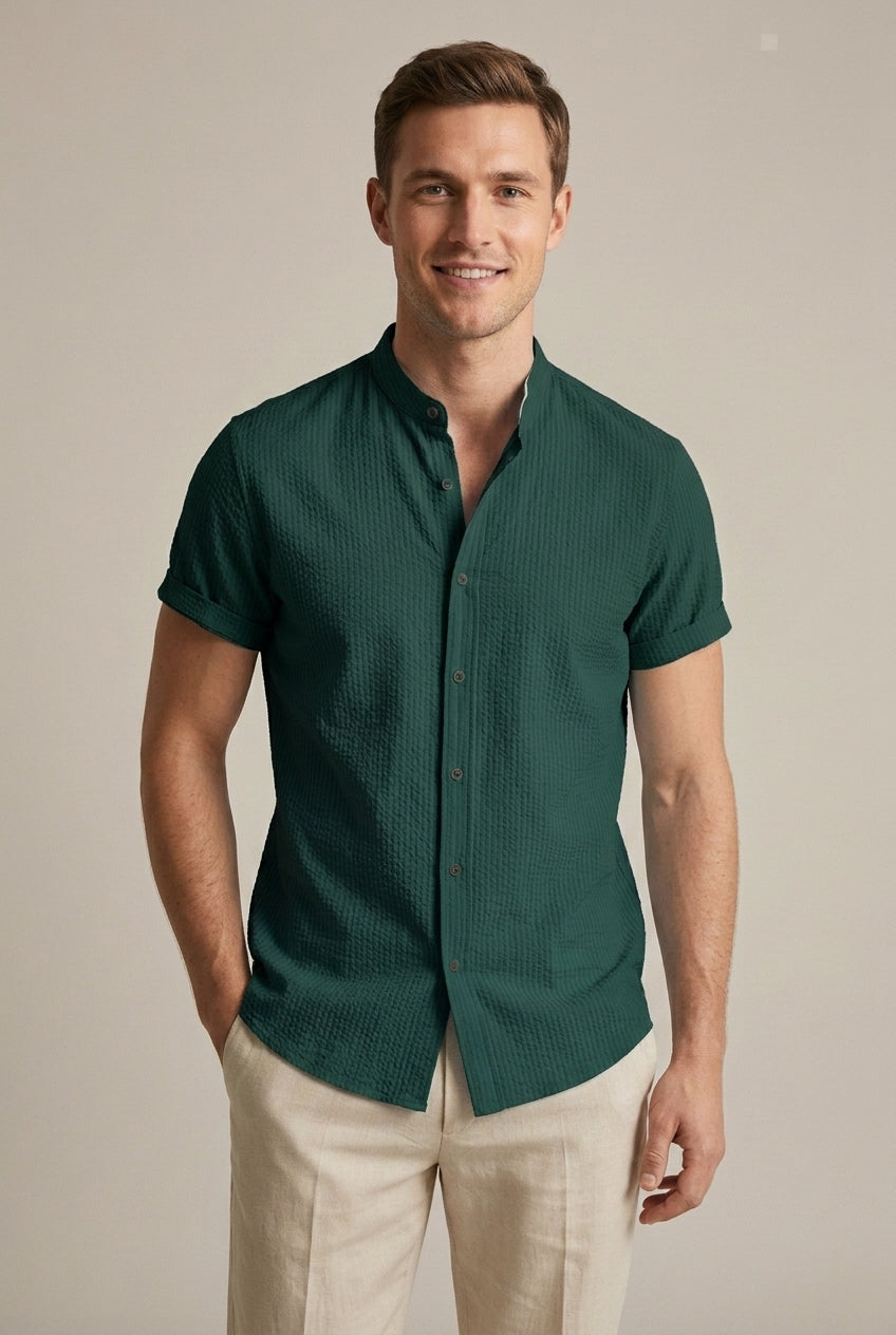 Front view of a men's band collar textured short sleeve summer shirt. Loose fit, ideal for smart casual summer style.