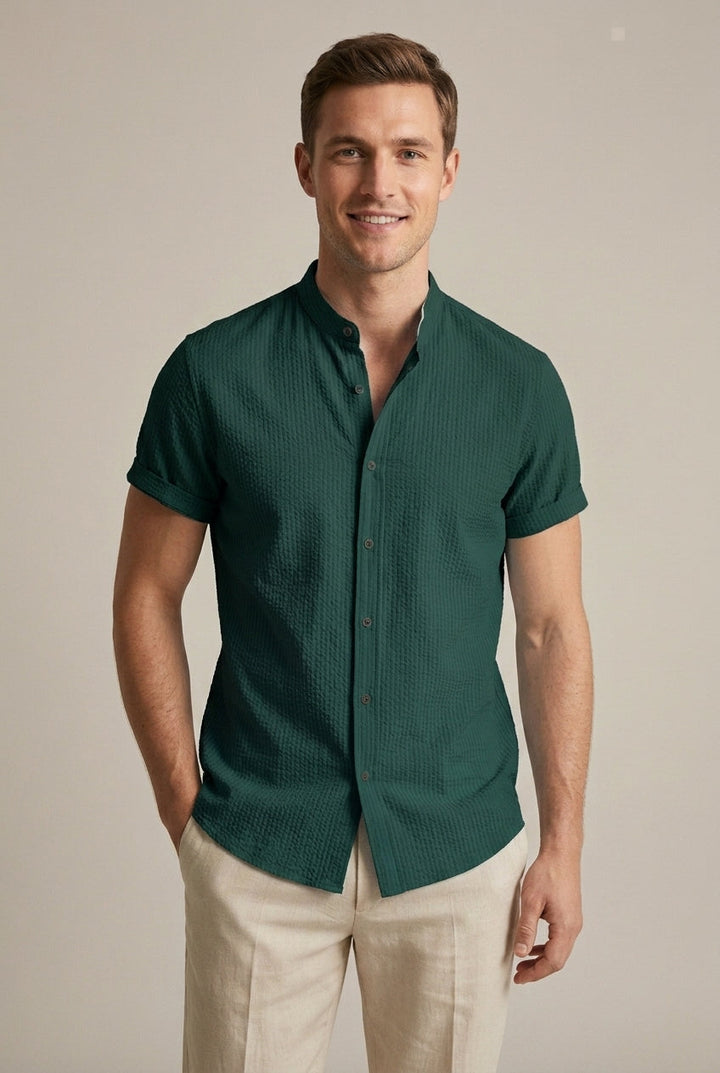 Front view of a men's band collar textured short sleeve summer shirt. Loose fit, ideal for smart casual summer style.