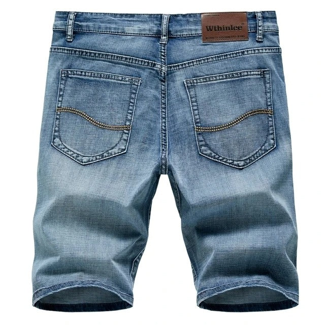 Classic blue denim shorts for men, comfortable everyday style, perfect for summer wear.