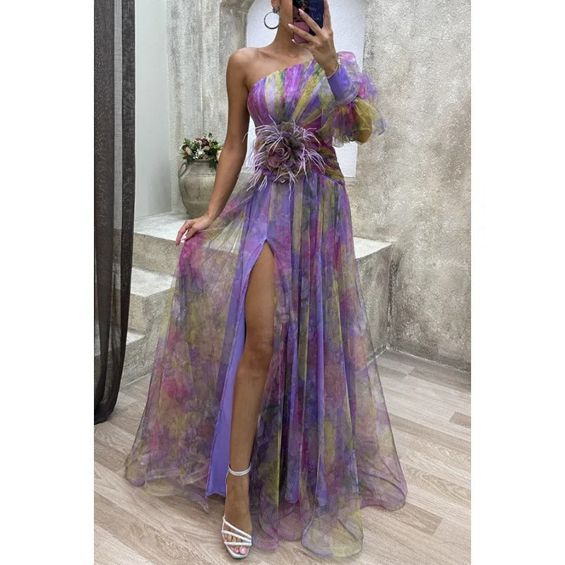 Stylish women's elegant floral maxi dress featuring an asymmetrical hem, ideal for summer formal wear.