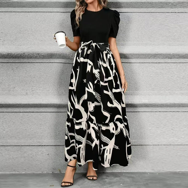 Versatile women's flowy maxi dress featuring a beautiful botanical print, suitable for vacation & summer.